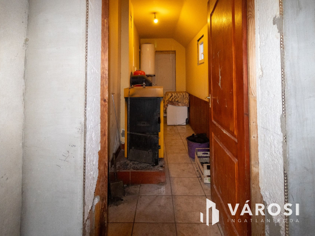 Újszerű, tetőteres téglaház az Almáskertekben