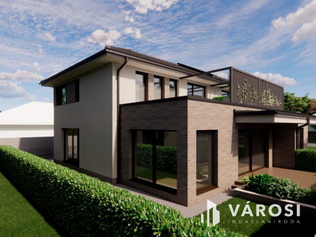 Debrecen csendes kertvárosi részén ELADÓ IKERHÁZ