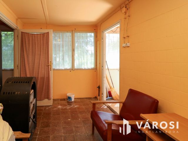 2219 nm-es fejlesztési telek nyaralóval Balatonfenyvesen